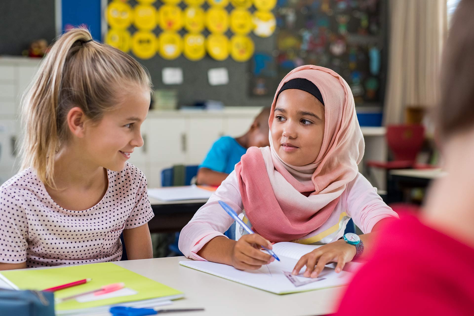 muslim-girl-with-her-classmate-P9L7Z2F.jpg